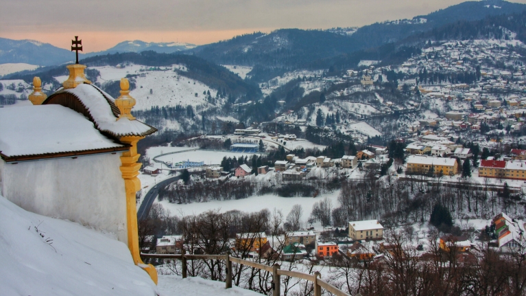 A view of Banská Štiavnica and surrounding mountains during winter